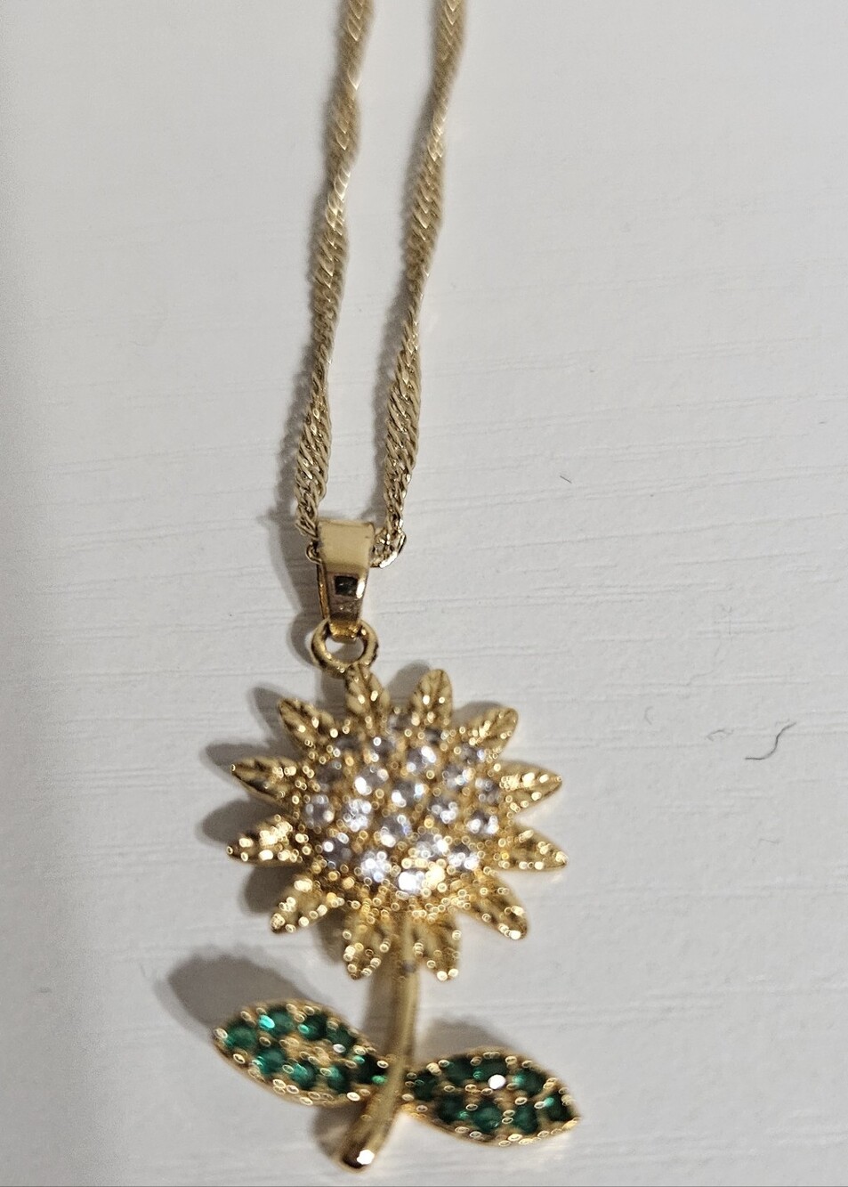 Gold Sunflower Pendant Necklace with Green Leaf Accents